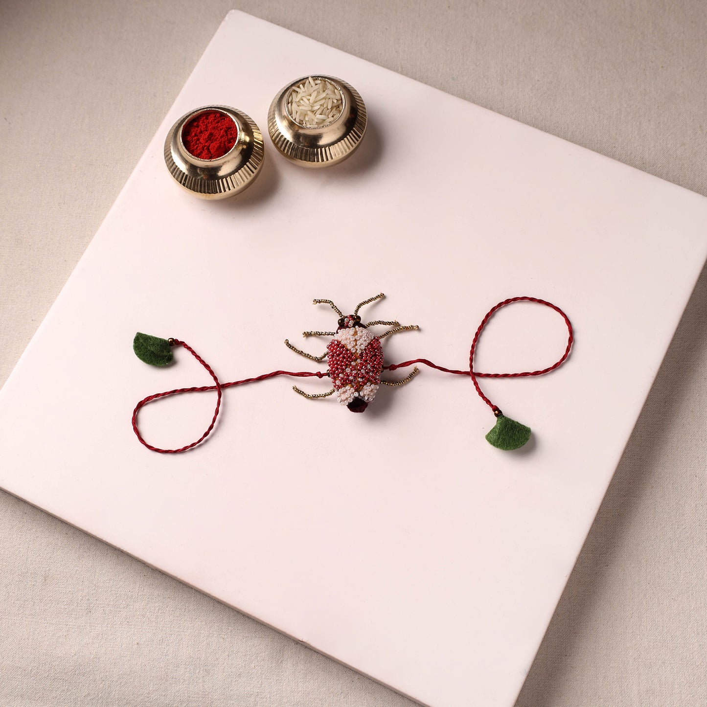 Cockroach - Reusable Hand Embroidered Bead Work Rakhi 02
