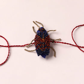 Cockroach - Reusable Hand Embroidered Bead Work Rakhi 04