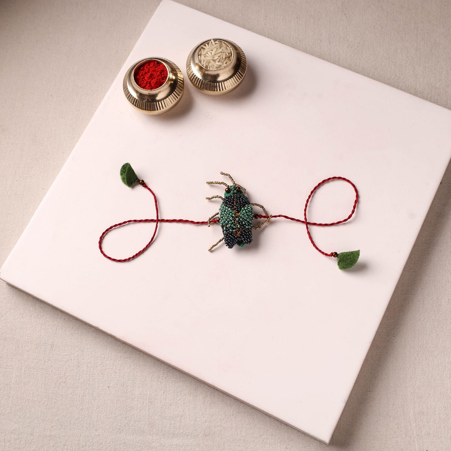 Cockroach - Reusable Hand Embroidered Bead Work Rakhi 09
