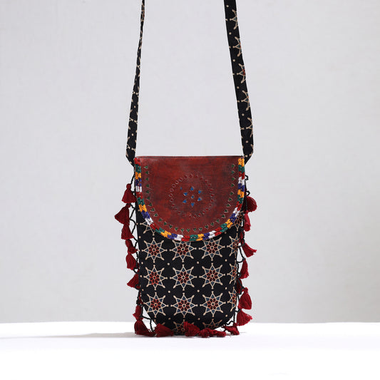 Black - Kutch Leather & Mashru Silk Sling Bag with Tassels 30