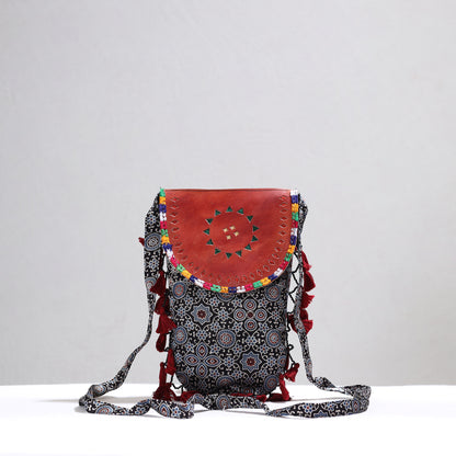 Black - Kutch Leather & Mashru Silk Sling Bag with Tassels 33