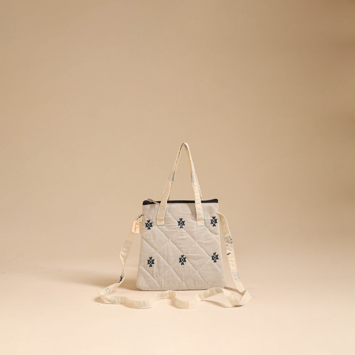 Handcrafted quilted sling bag 16