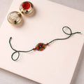 Pattachitra Handpainted Wooden Rakhi 44