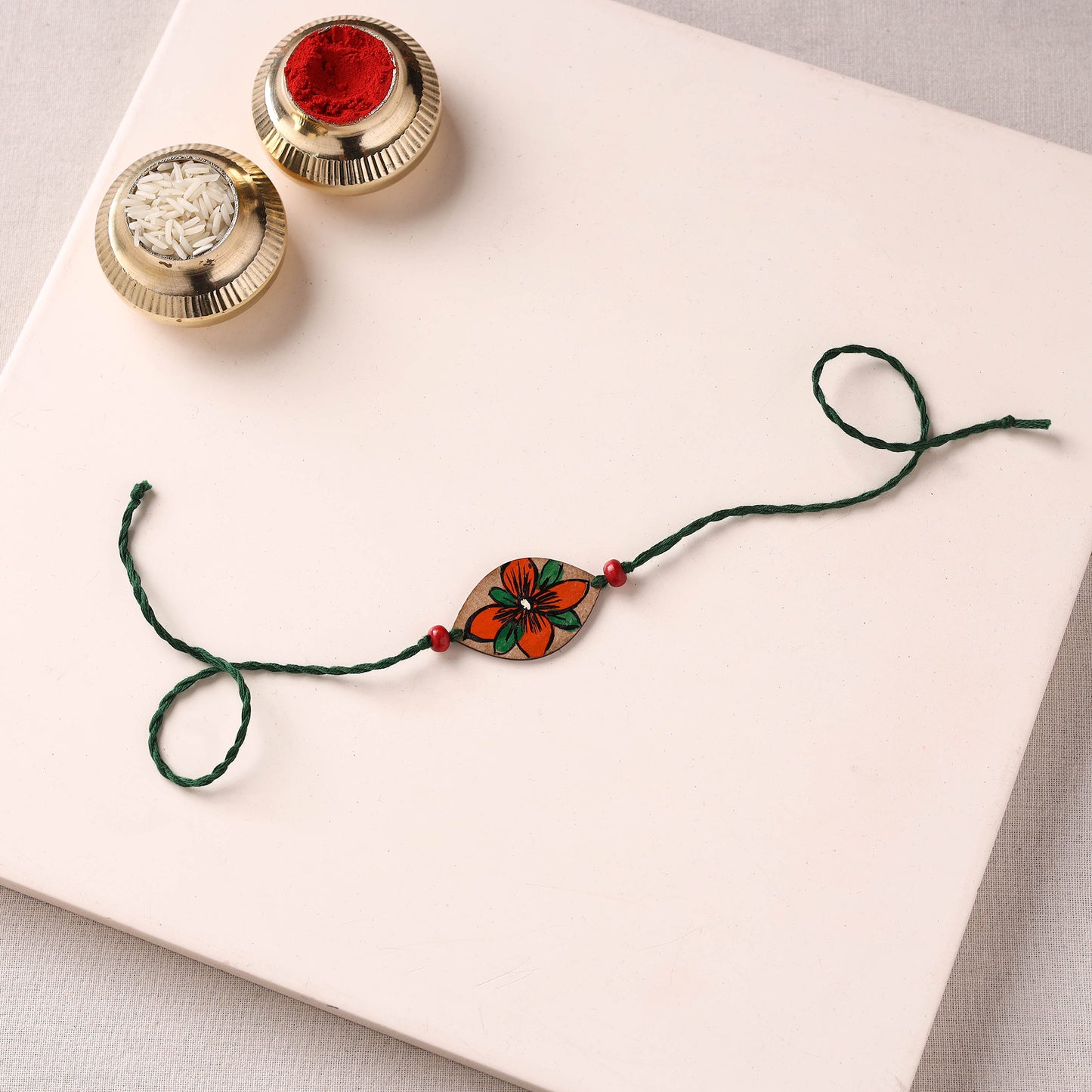 Pattachitra Handpainted Wooden Rakhi 44