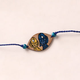 Pattachitra Handpainted Wooden Rakhi 01