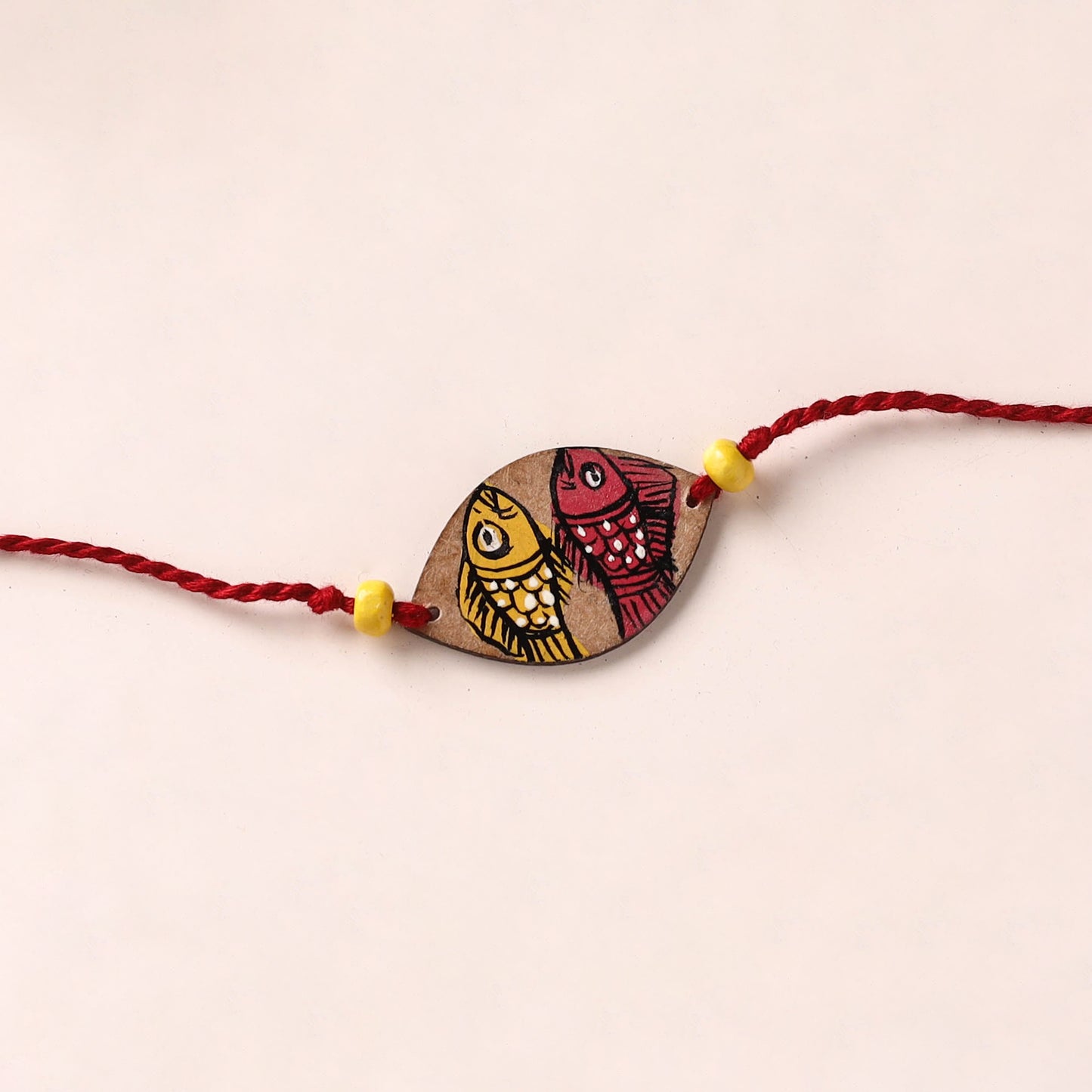 Pattachitra Handpainted Wooden Rakhi 02