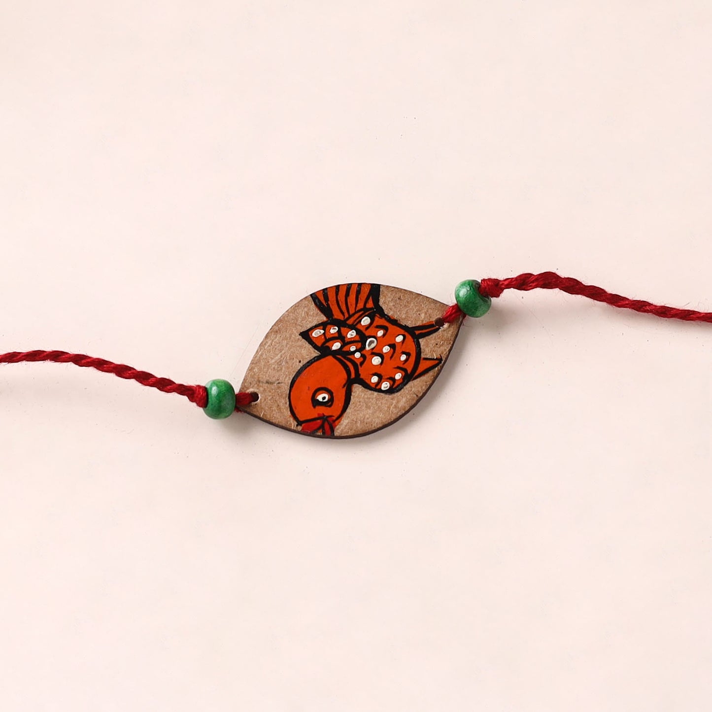 Pattachitra Handpainted Wooden Rakhi 03