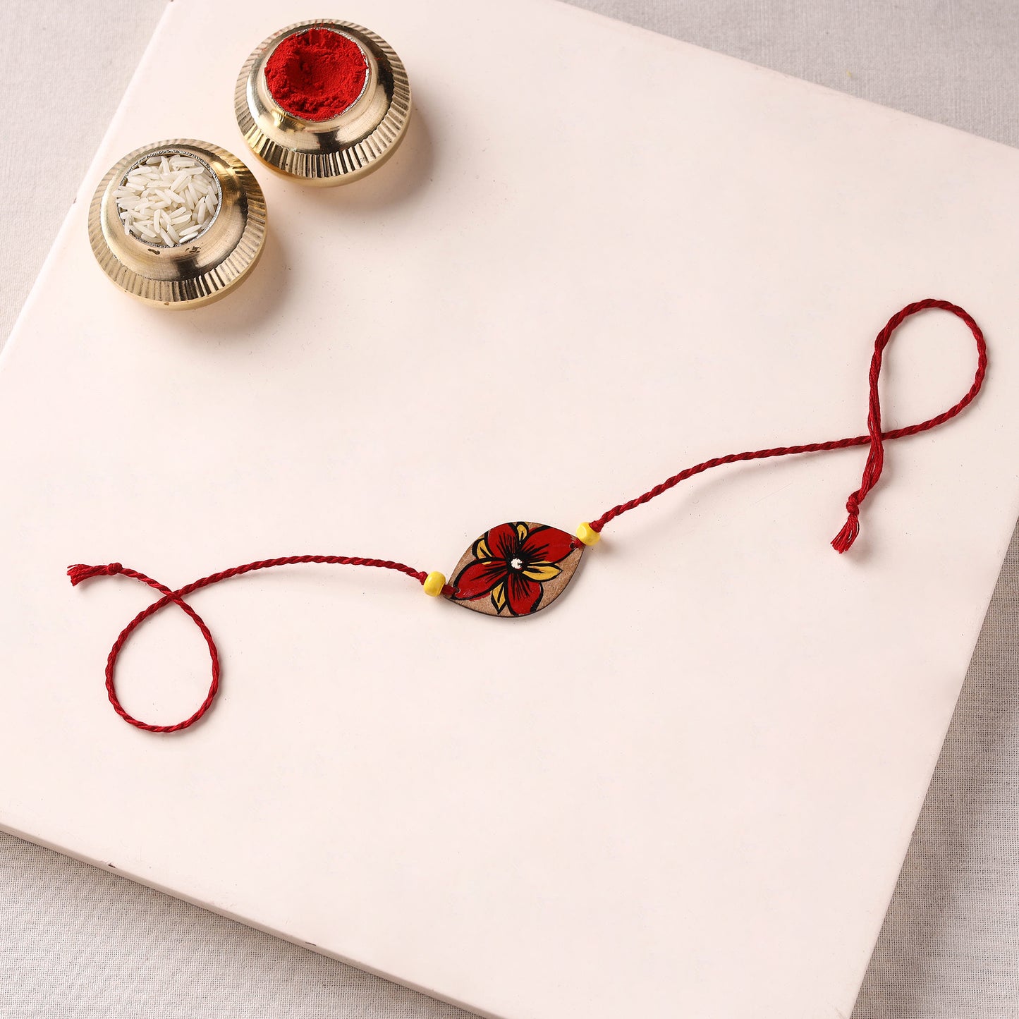 Pattachitra Handpainted Wooden Rakhi 04