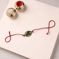 Pattachitra Handpainted Wooden Rakhi 05