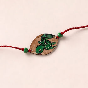 Pattachitra Handpainted Wooden Rakhi 05