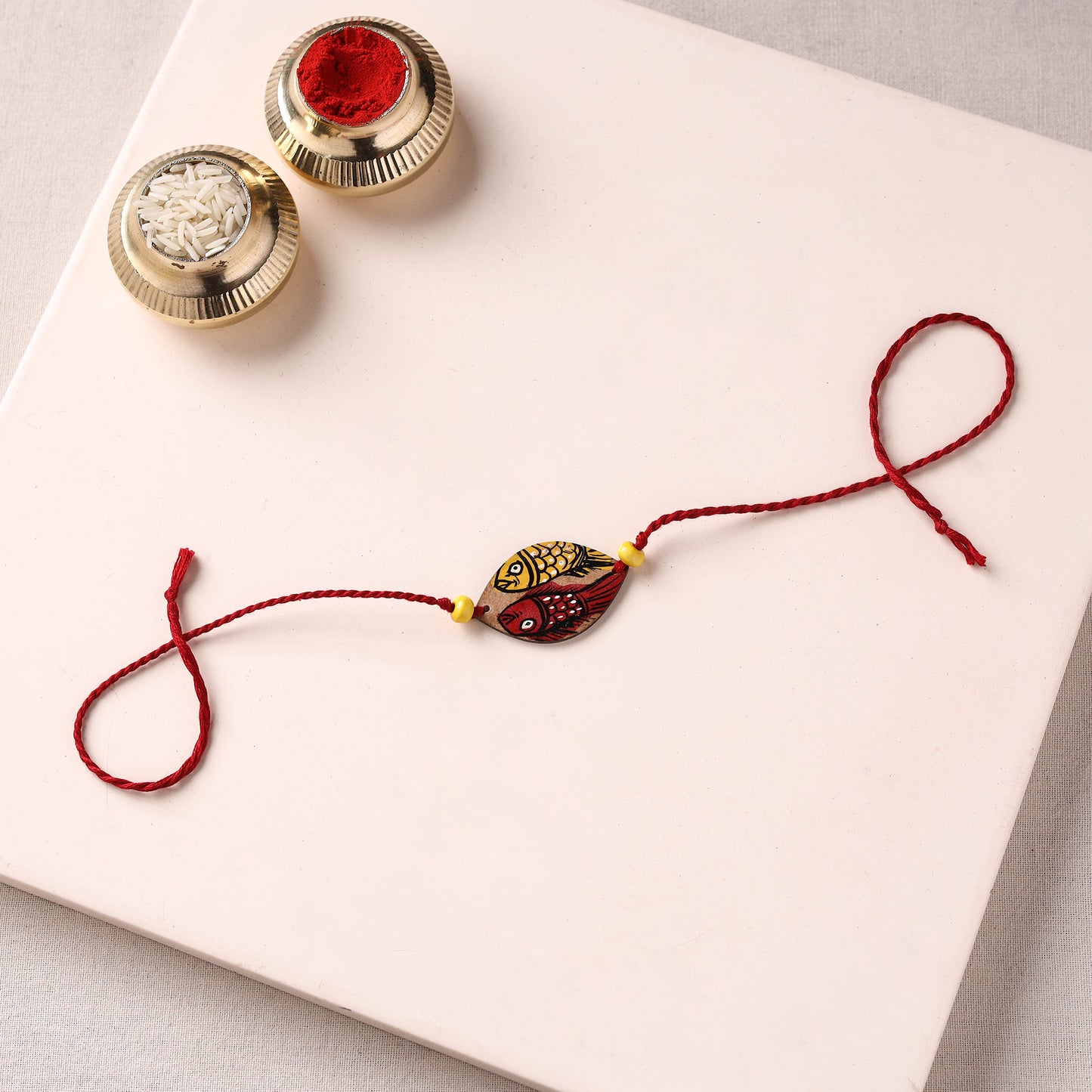 Pattachitra Handpainted Wooden Rakhi 06