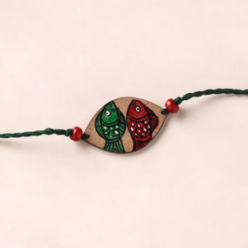 Pattachitra Handpainted Wooden Rakhi 07
