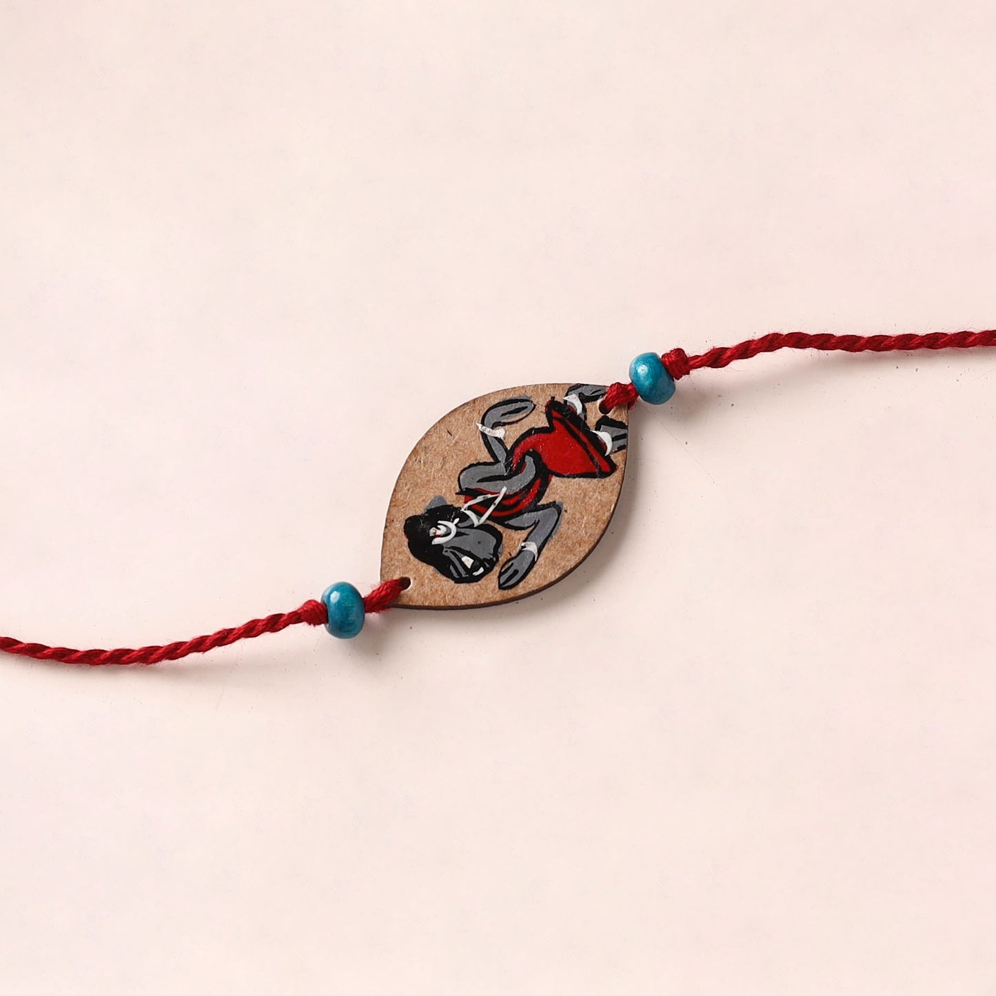 Pattachitra Handpainted Wooden Rakhi 09