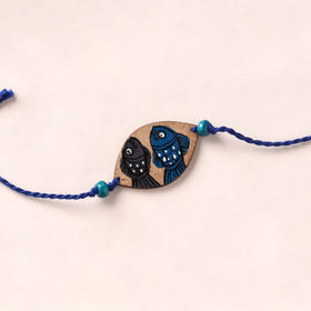 Pattachitra Handpainted Wooden Rakhi 10