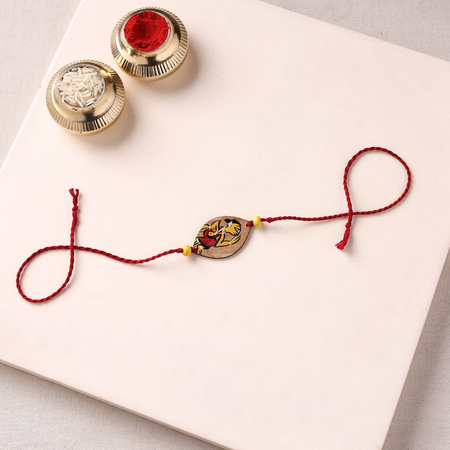 Pattachitra Handpainted Wooden Rakhi 11