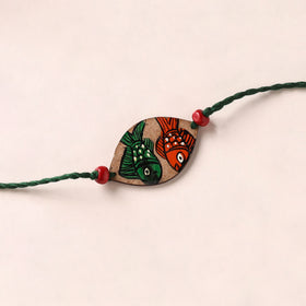 Pattachitra Handpainted Wooden Rakhi 12