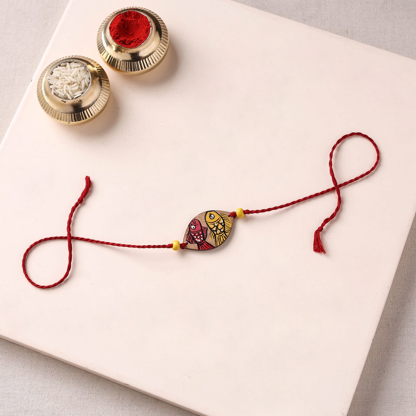 Pattachitra Handpainted Wooden Rakhi 14