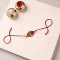 Pattachitra Handpainted Wooden Rakhi 17