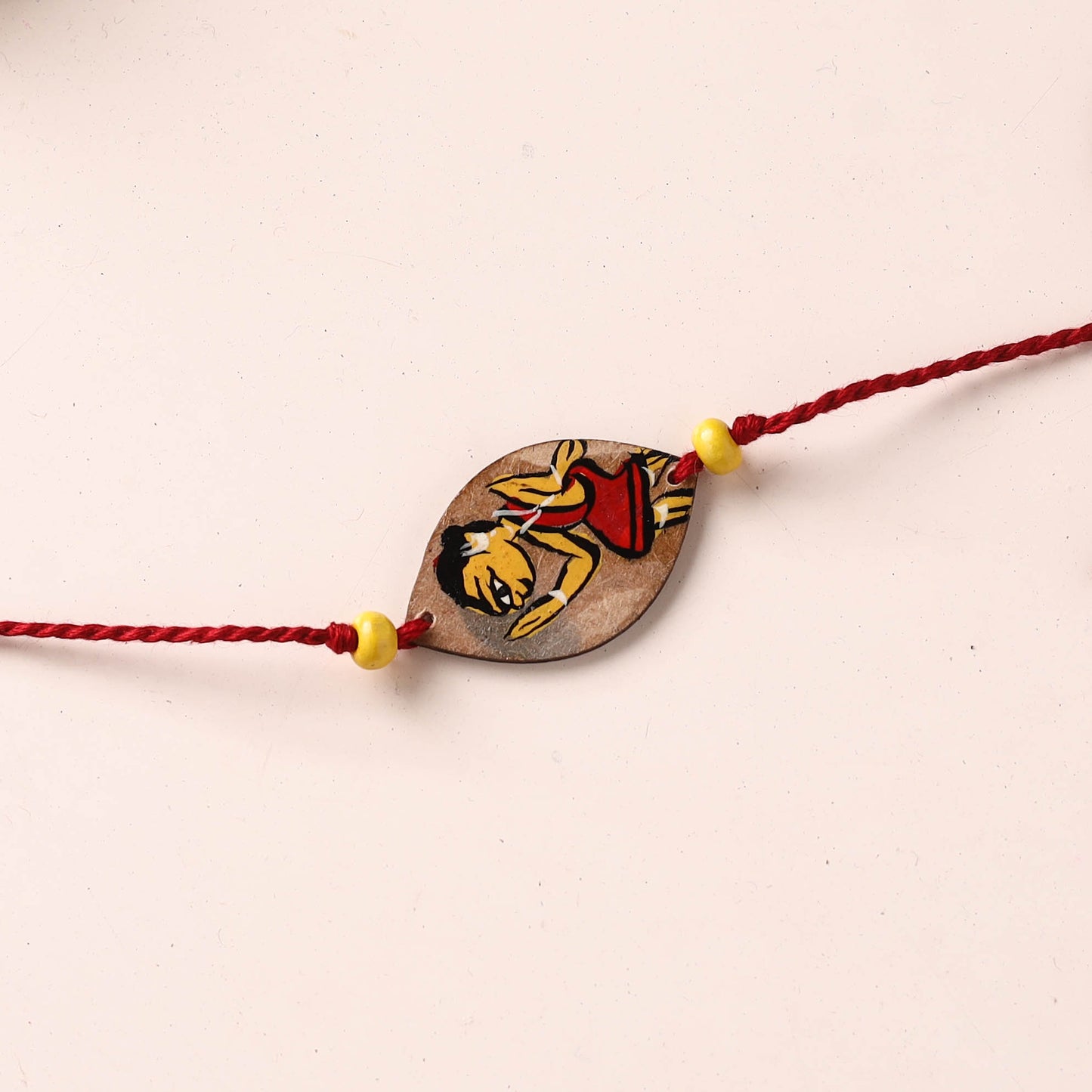 Pattachitra Handpainted Wooden Rakhi 17