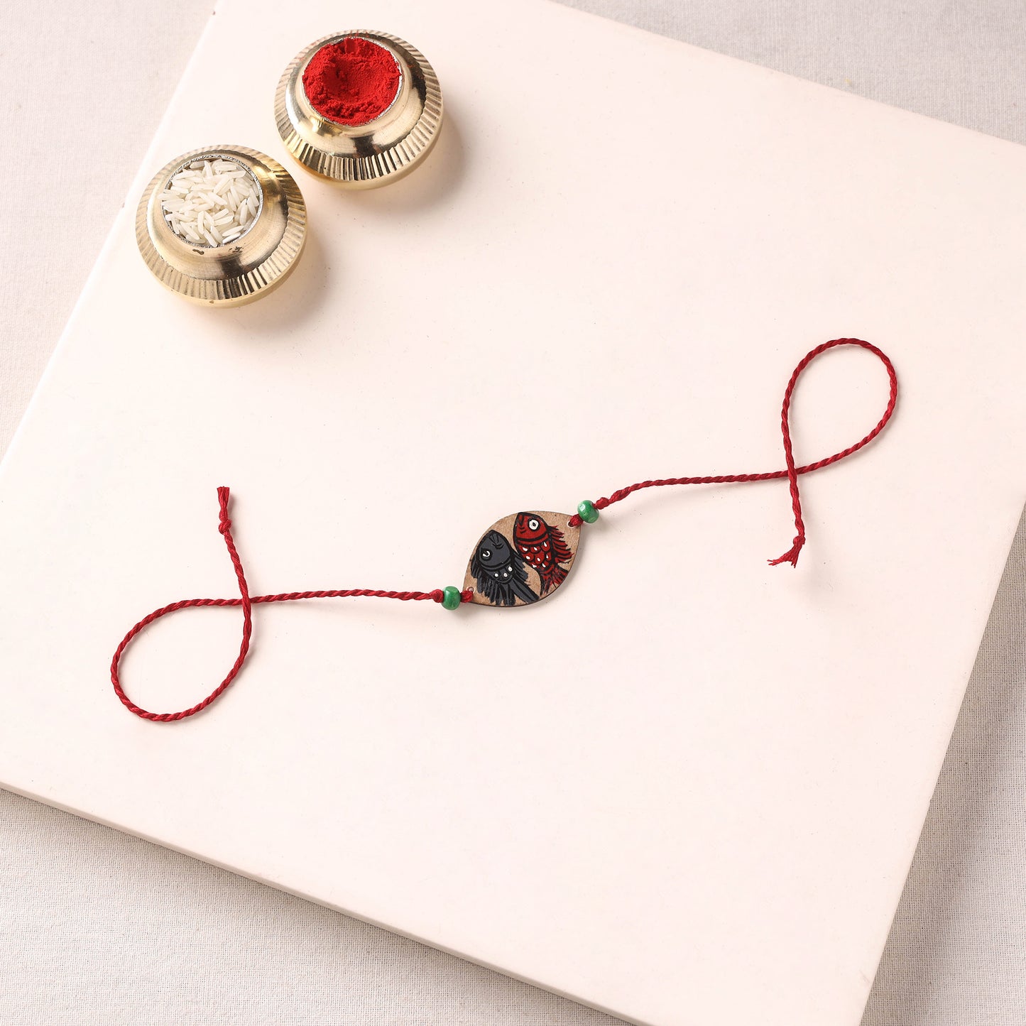 Pattachitra Handpainted Wooden Rakhi 23