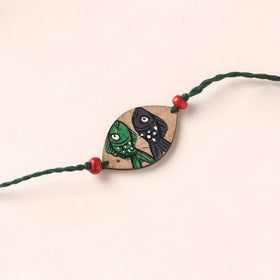 Pattachitra Handpainted Wooden Rakhi 24