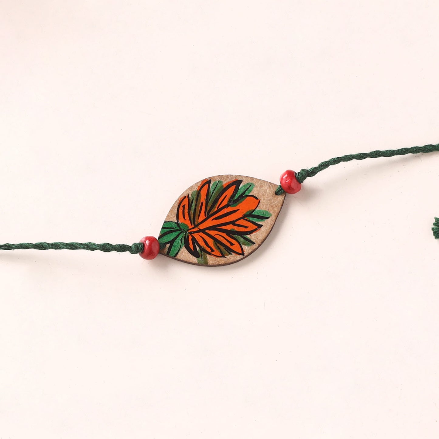 Pattachitra Handpainted Wooden Rakhi 26