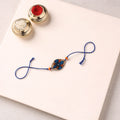 Pattachitra Handpainted Wooden Rakhi 28