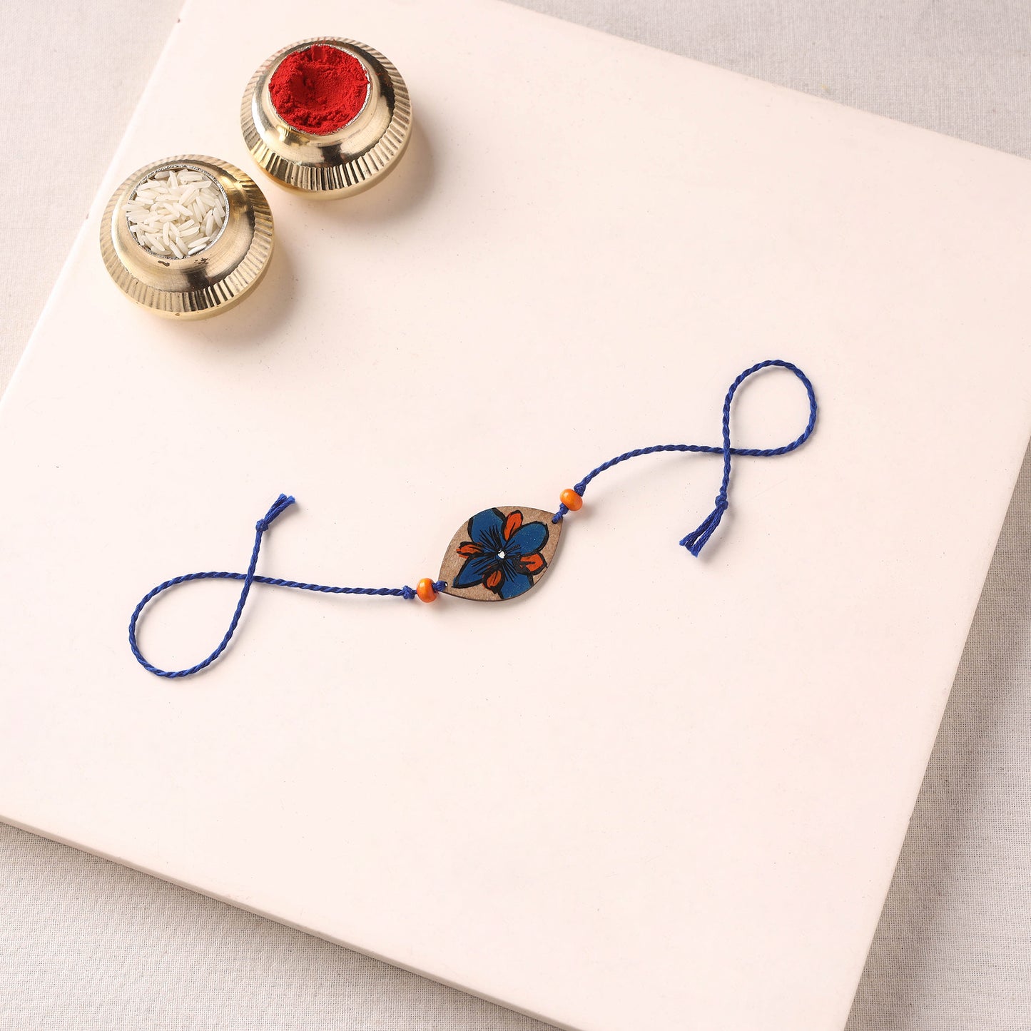 Pattachitra Handpainted Wooden Rakhi 28