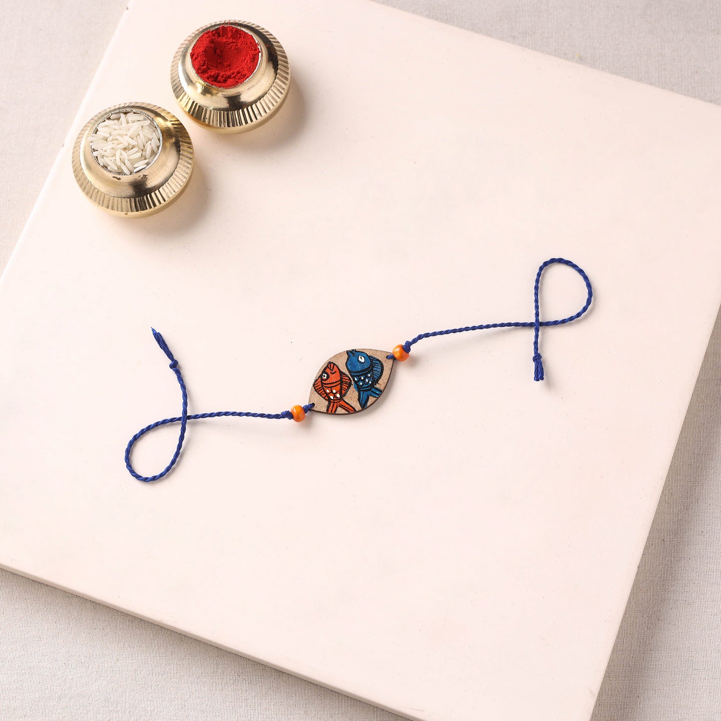 Pattachitra Handpainted Wooden Rakhi 29