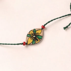 Pattachitra Handpainted Wooden Rakhi 30