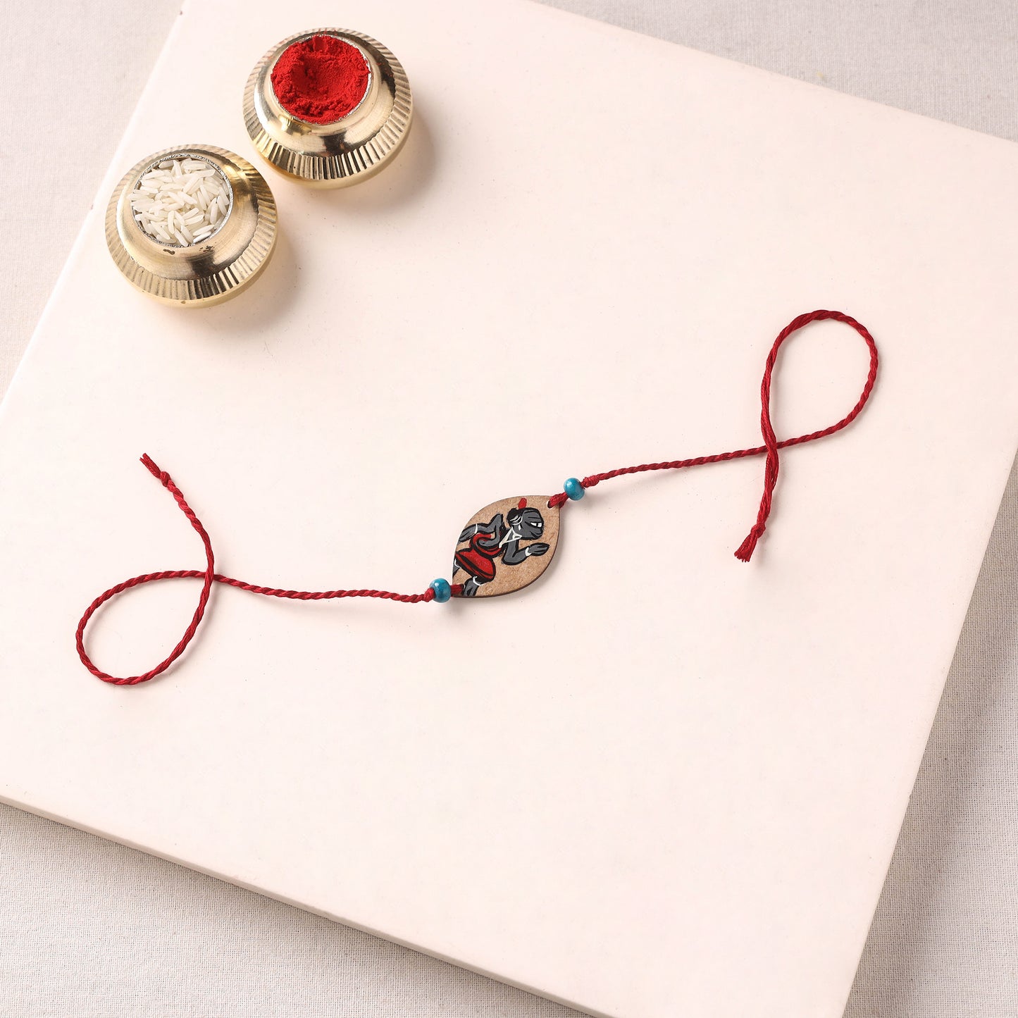 Pattachitra Handpainted Wooden Rakhi 31