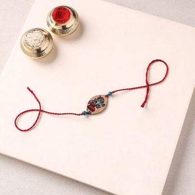 Pattachitra Handpainted Wooden Rakhi 31