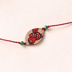 Pattachitra Handpainted Wooden Rakhi 32