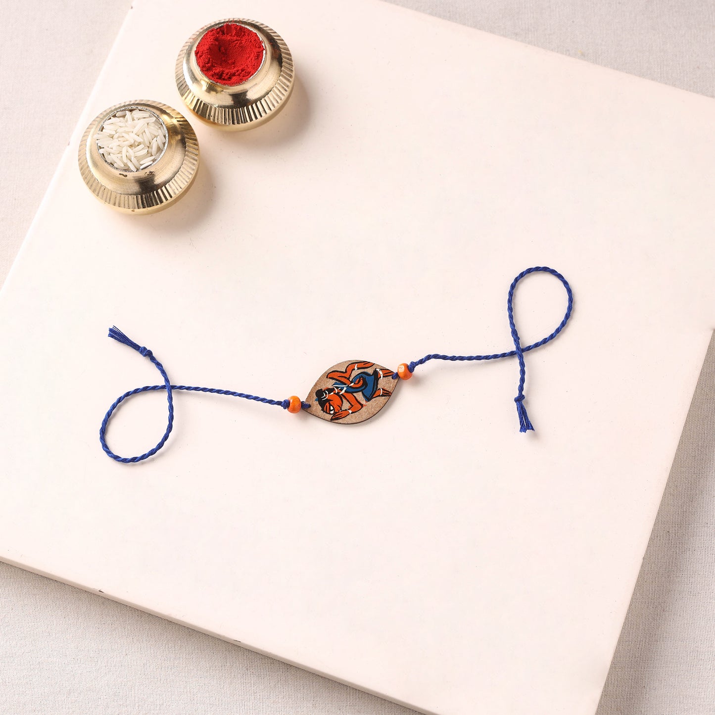 Pattachitra Handpainted Wooden Rakhi 33
