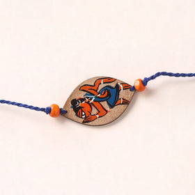 Pattachitra Handpainted Wooden Rakhi 33