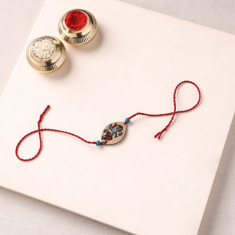 Pattachitra Handpainted Wooden Rakhi 34