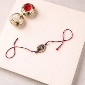 Pattachitra Handpainted Wooden Rakhi 34