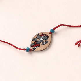 Pattachitra Handpainted Wooden Rakhi 34