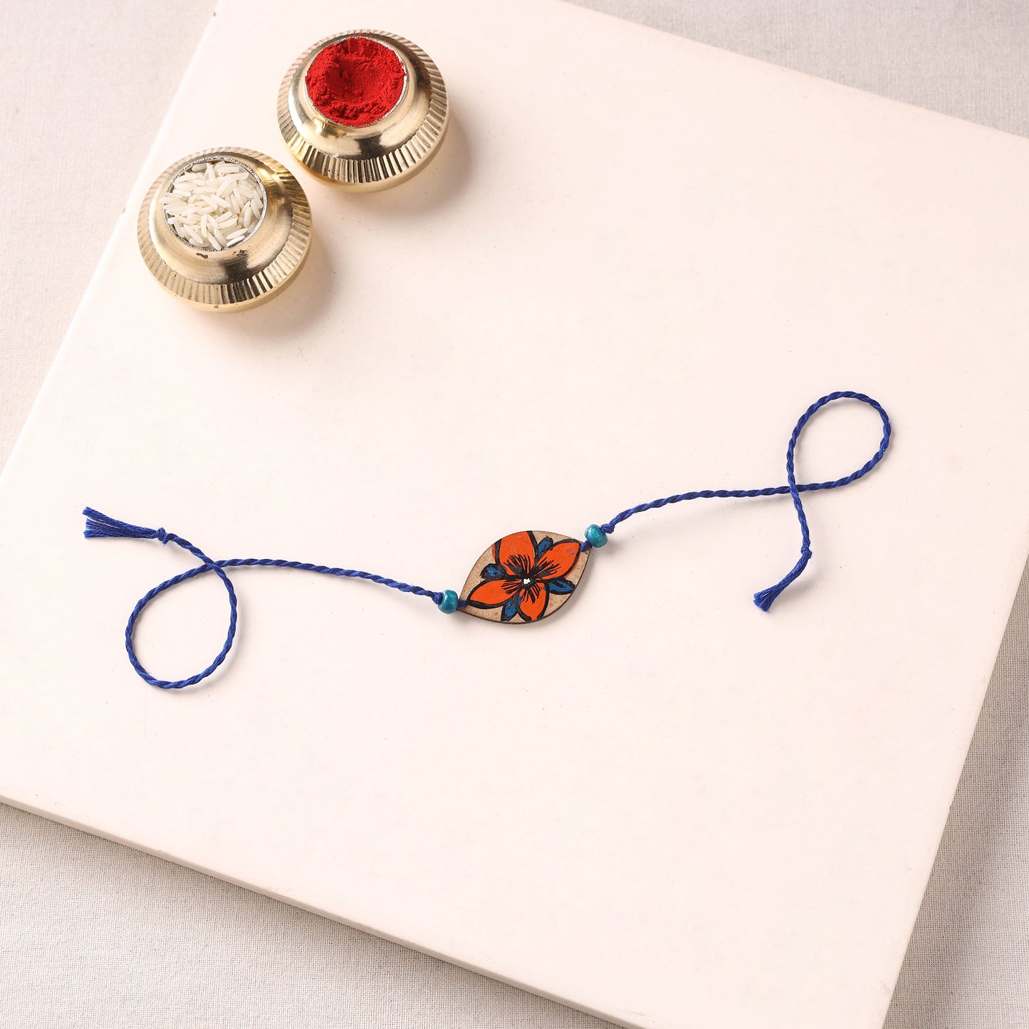Pattachitra Handpainted Wooden Rakhi 35