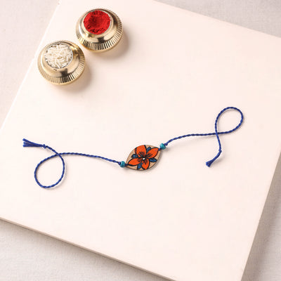 Pattachitra Handpainted Wooden Rakhi 35
