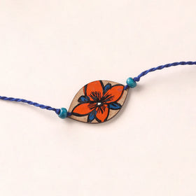 Pattachitra Handpainted Wooden Rakhi 35