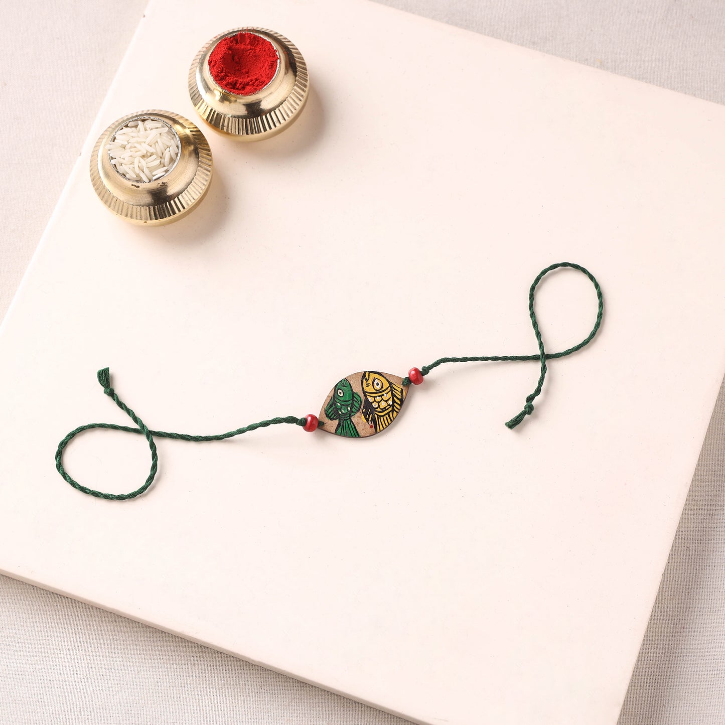Pattachitra Handpainted Wooden Rakhi 36