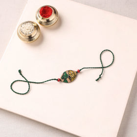 Pattachitra Handpainted Wooden Rakhi 36