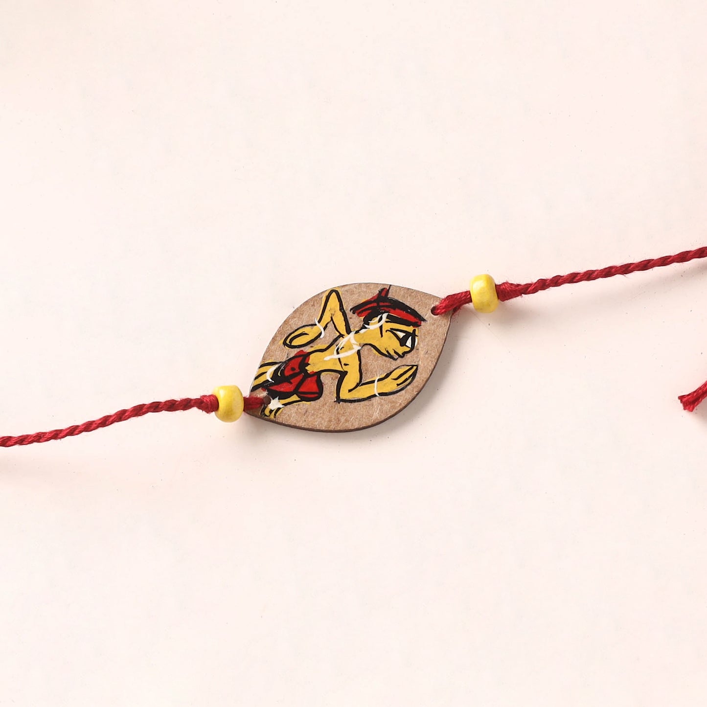 Pattachitra Handpainted Wooden Rakhi 37