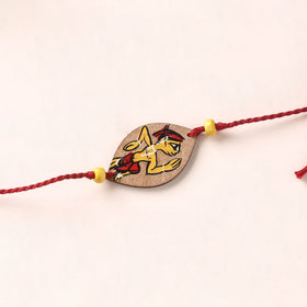 Pattachitra Handpainted Wooden Rakhi 37