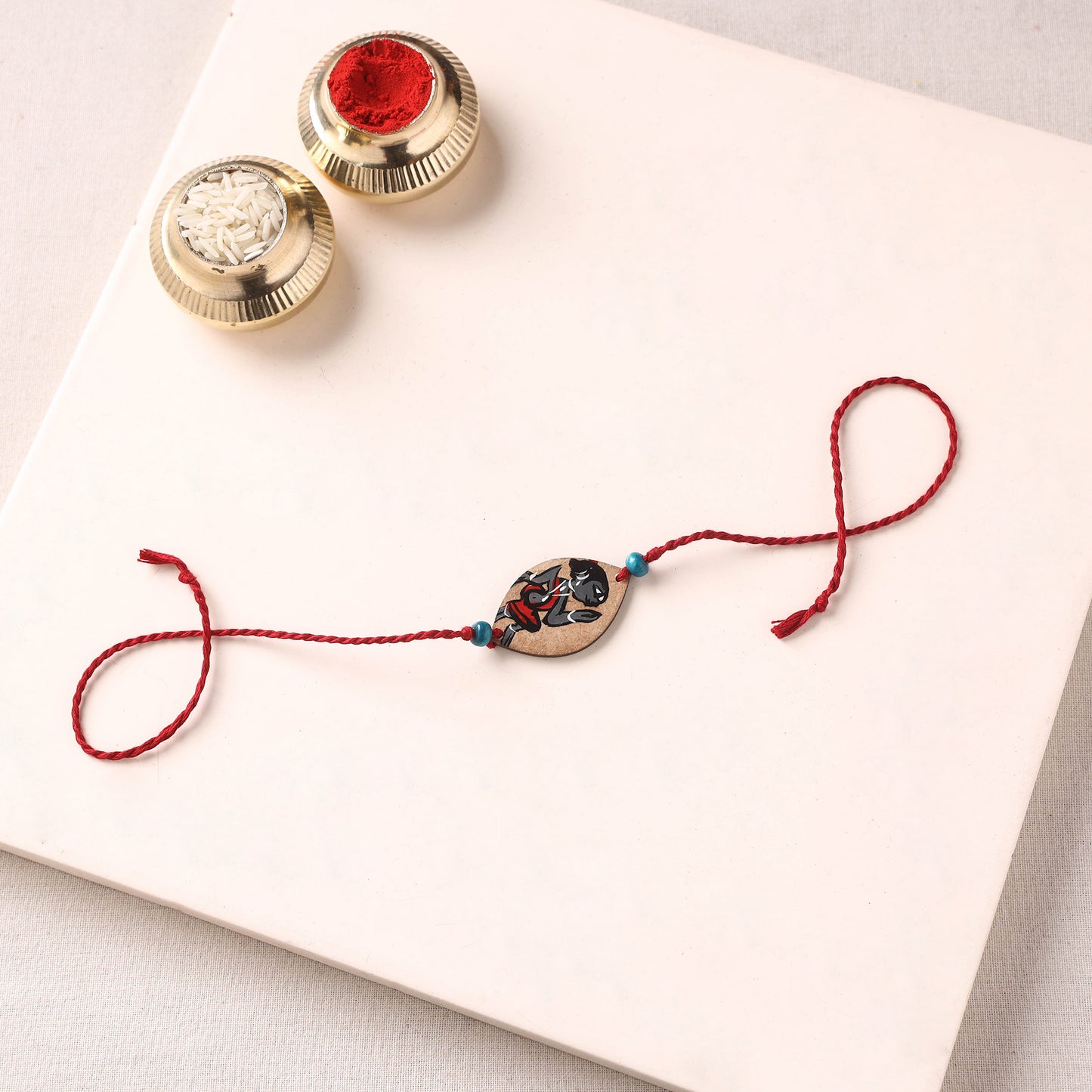 Pattachitra Handpainted Wooden Rakhi 38