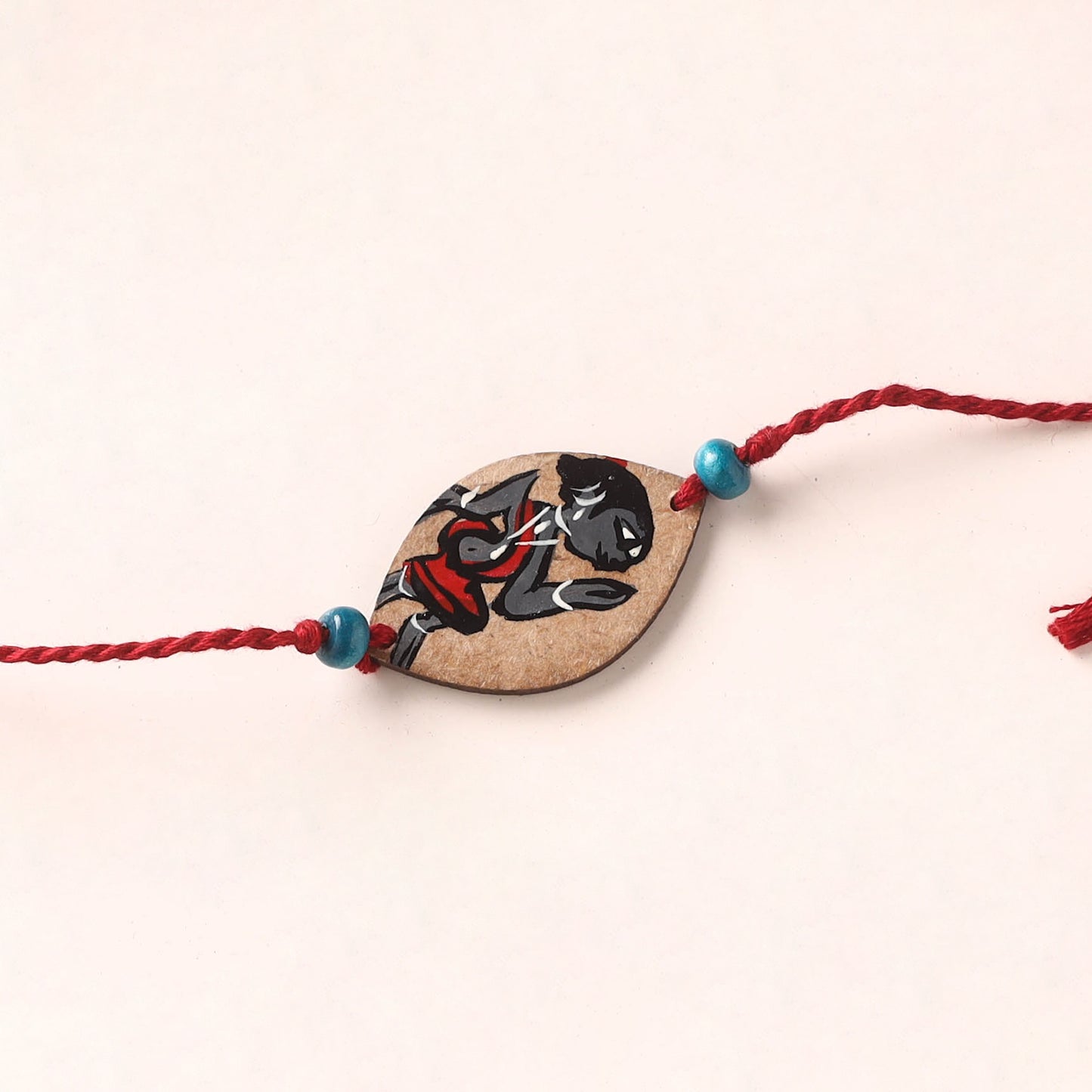 Pattachitra Handpainted Wooden Rakhi 38