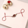 Pattachitra Handpainted Wooden Rakhi 40