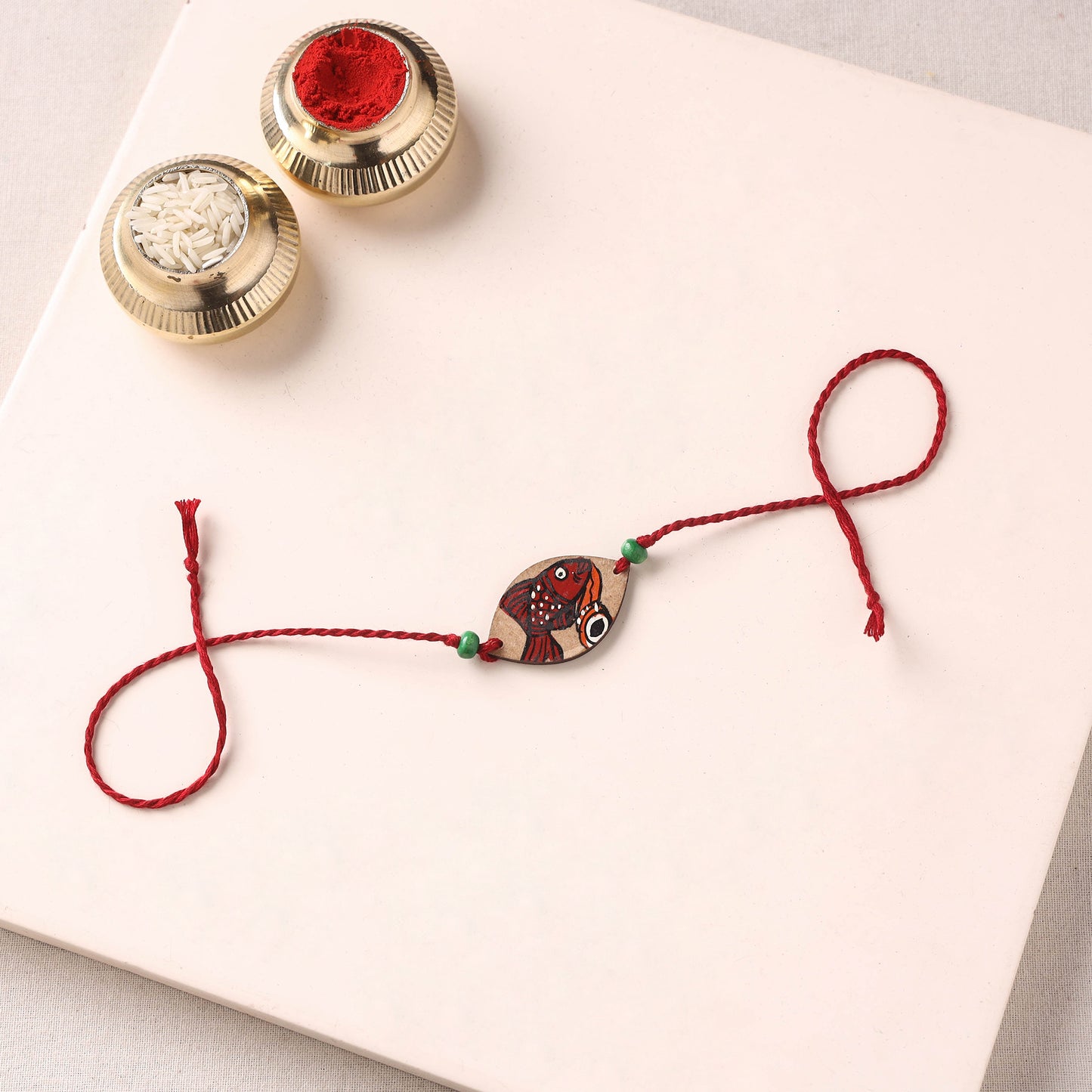 Pattachitra Handpainted Wooden Rakhi 40