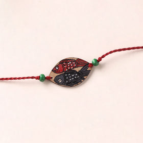 Pattachitra Handpainted Wooden Rakhi 41